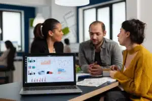 Business owner analyzing Generative Engine Optimization results with Wedū Media's GEO strategy